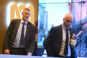 Австралия притиска журналисти