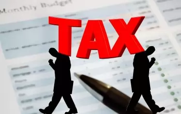 Забавеното плащане на данъци и такси вече се наказва с 11.42% лихва
